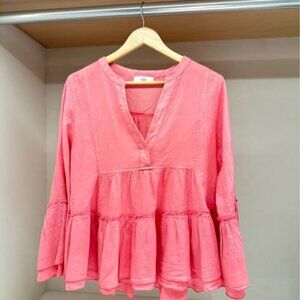 Pink cotton blouse.